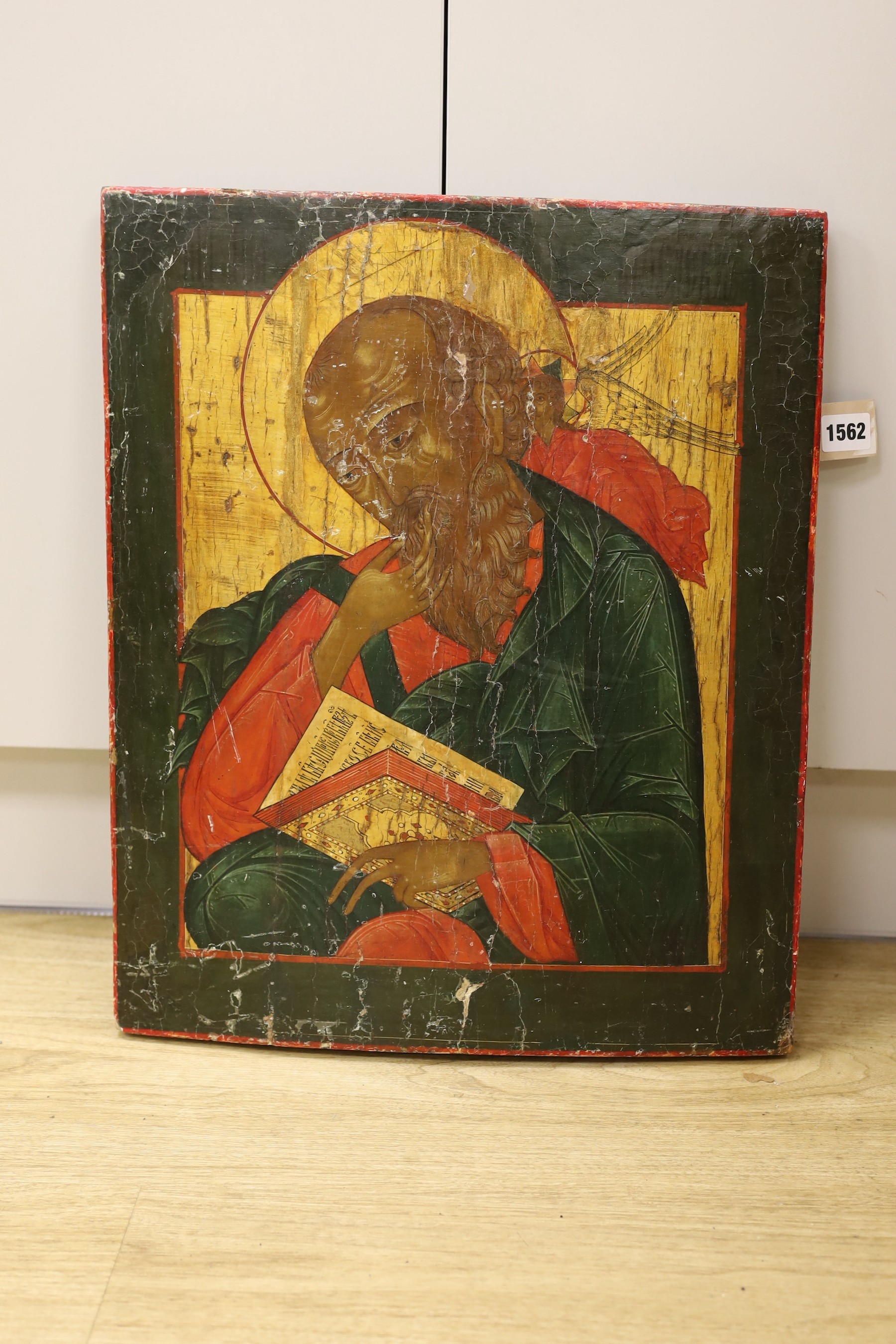 19th Century Russian School, tempera on wooden panel, Icon of St John the Evangelist, Maria Andipa label verso, 51 x 43cm
